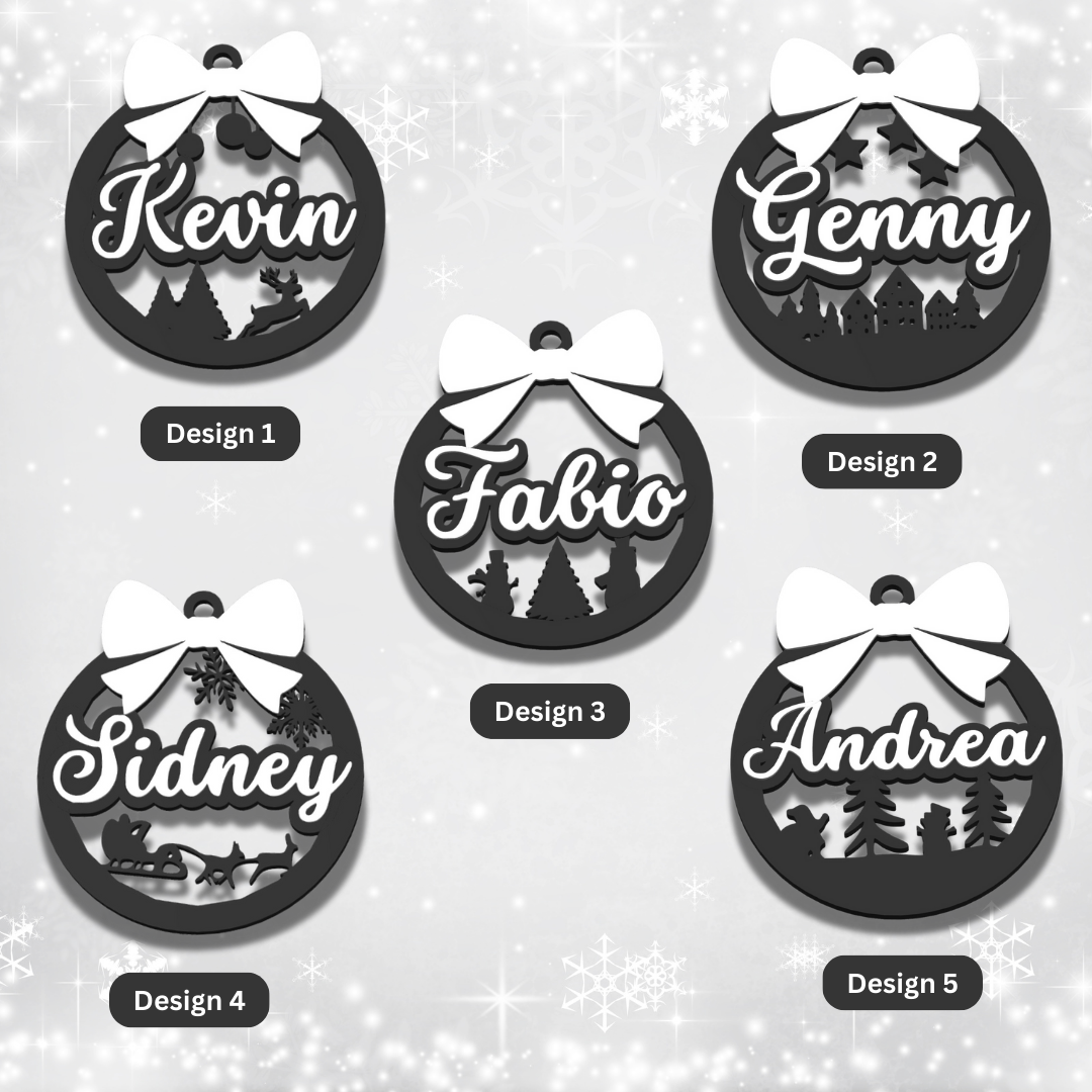 Set of personalized black Christmas ornaments with names on a light gray background