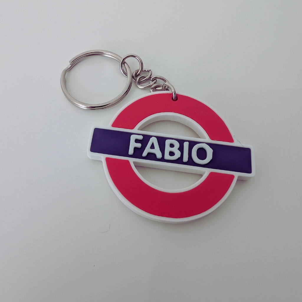 Personalised London underground keychain with displaying Keychain displaying 'FABIO' 