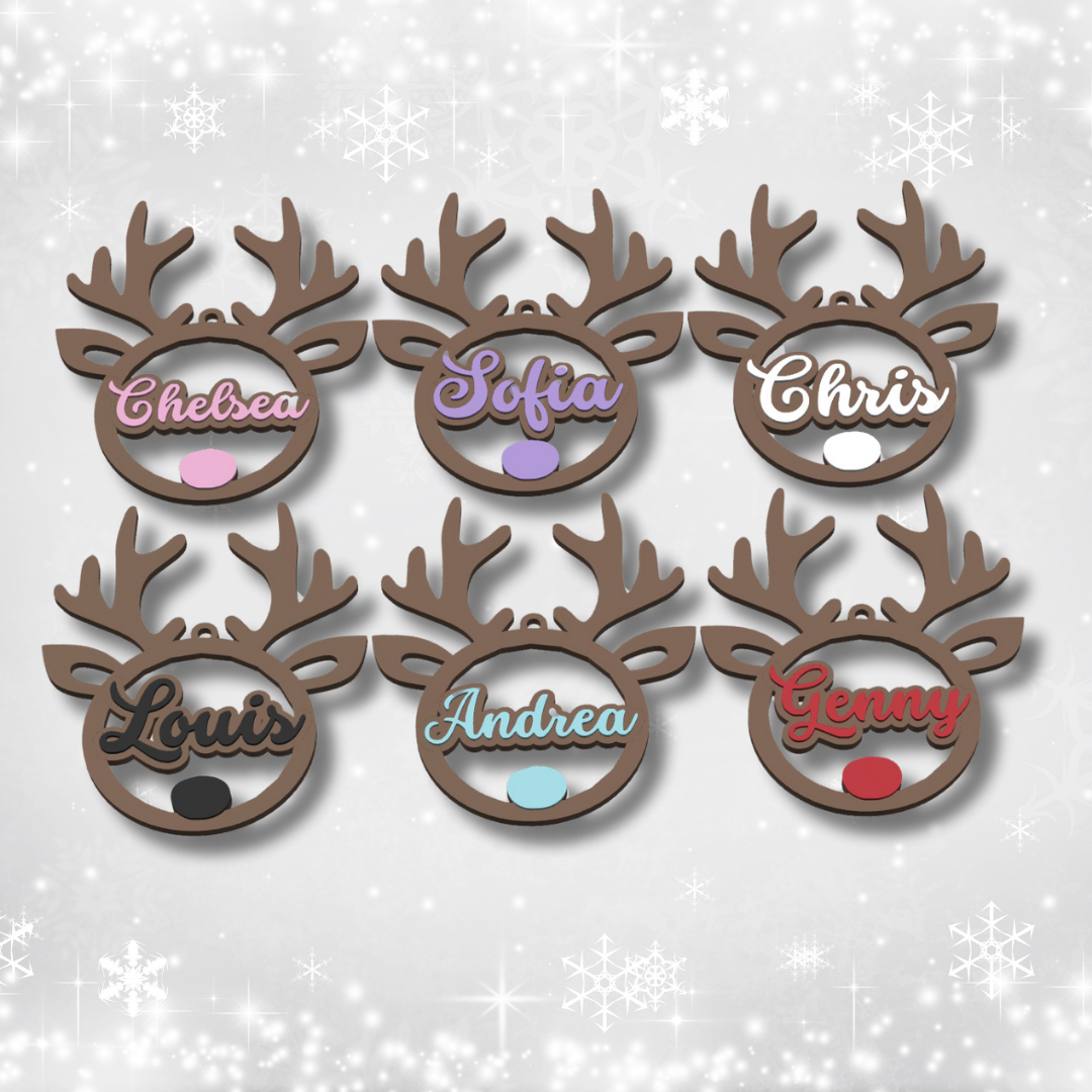 Set of six reindeer-shaped nameplates with personalized names on a light gray background.