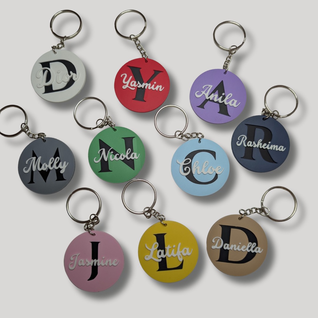 Set of personalized keychains with names on a white background