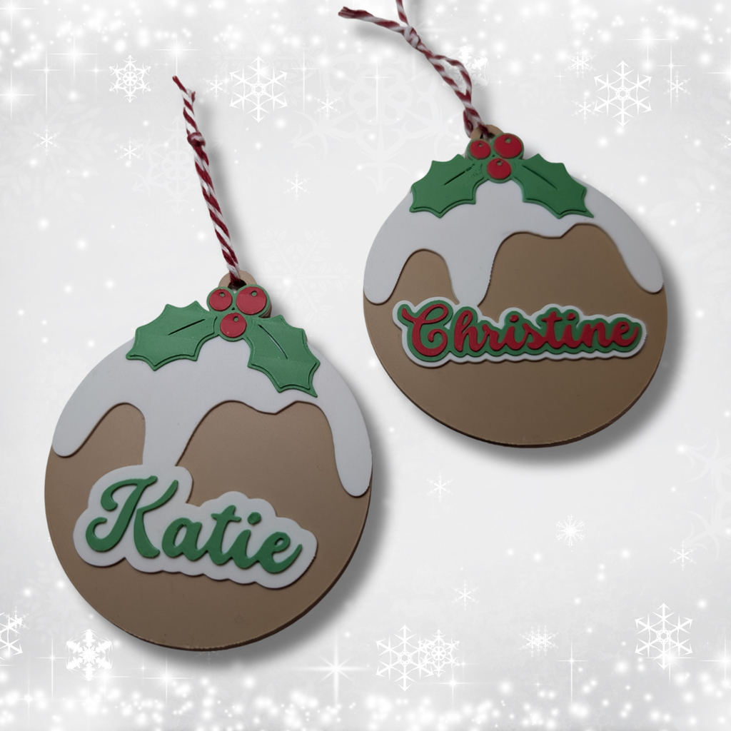 Two Christmas-themed ornaments shaped like pies with names 'Katie' and 'Christine' on a snowy background.